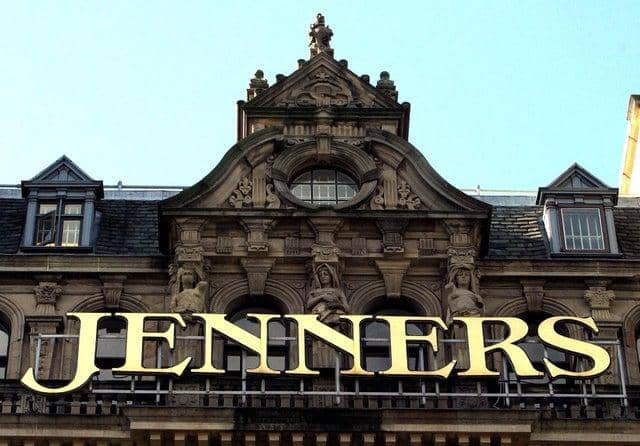 The owner of Edinburgh's Jenners building has launched an investigation after the iconic signage was removed from the landmark store.