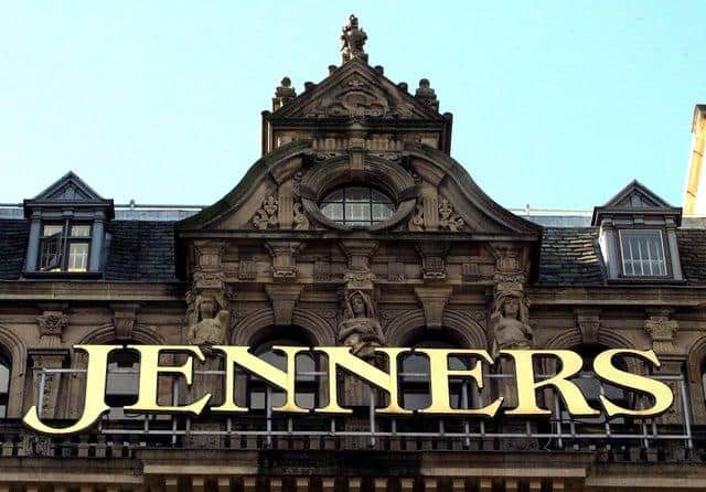 The owner of Edinburgh's Jenners building has launched an investigation after the iconic signage was removed from the landmark store.