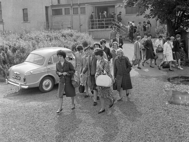Staff from Edinburgh's Telegraph Condenser Company leave a meeting where it was agreed to strike in August 1965.
