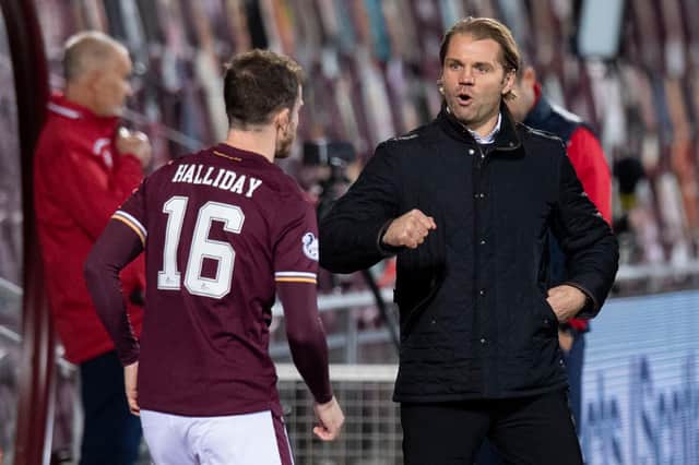 Robbie Neilson praised his Hearts side after crushing Dundee 6-2.