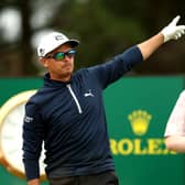 Bob MacIntyre watches on as Rickie Fowler gestures after teeing off on the 18th hole on day three of The 151st Open. Picture: Luke Walker/Getty Images for HSBC.