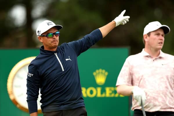 Bob MacIntyre watches on as Rickie Fowler gestures after teeing off on the 18th hole on day three of The 151st Open. Picture: Luke Walker/Getty Images for HSBC.