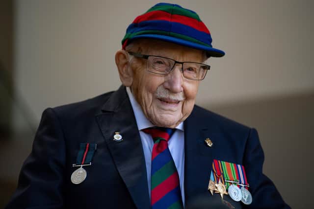 File photo dated 24/9/2020 of Captain Sir Tom Moore in Marston Moretaine, Bedford at the launch event for the Lloyd Scott Three Peaks Challenge. Captain Sir Tom Moore has died at the age of 100 after testing positive for Covid-19, his daughters Hannah and Lucy said in a statement. Issue date: Tuesday February 2, 2021. PA Photo. See PA story DEATH CaptainTom. Photo credit: Jacob King/PA Wire