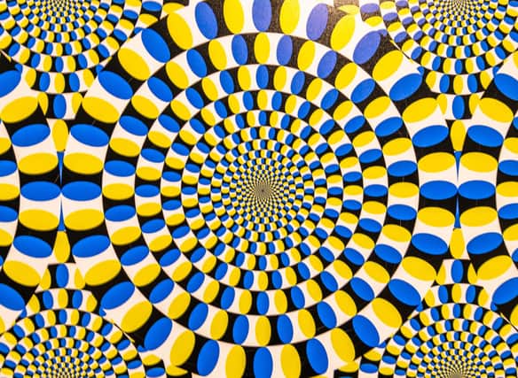Psychologists at the Universities of York and Glasgow have found staring at an optical illusion can improve visual acuity and allow you to see small print. Cr: Getty Images/Canva Pro