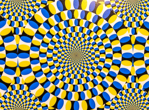 Psychologists at the Universities of York and Glasgow have found staring at an optical illusion can improve visual acuity and allow you to see small print. Cr: Getty Images/Canva Pro