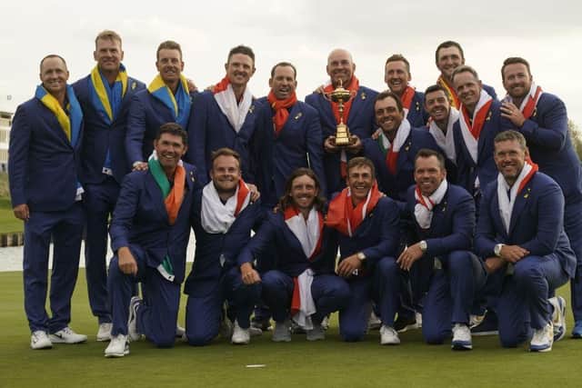 Europe's players celebrate with captain Thomas Bjorn and his vice captains after winning the 2018 Ryder Cup in France. Picture: Lionel Bonaventure/AFP via Getty Images.
