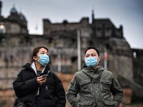 Tourists wearing face masks at Edinburgh Castle in January. Picture: Jeff J Mitchell.