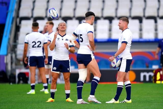 Scotland's Finn Russell (right) and Darcy Graham (left with ball) during the captain's run at the Stade de Marseille, Marseille.
