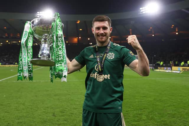 Celtic’s Anthony Ralston celebrates with the Premier Sports Cup trophy.