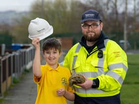 Harvey Dean-Evans, 9, from Wigan, as he is reunited with his pet tortoise 'Mary' which escaped from her home in August last year, after being found by grounds maintenance operative (Pic: Ian Robinson/ENWL/PA Wire )