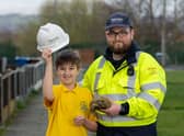 Harvey Dean-Evans, 9, from Wigan, as he is reunited with his pet tortoise 'Mary' which escaped from her home in August last year, after being found by grounds maintenance operative (Pic: Ian Robinson/ENWL/PA Wire )