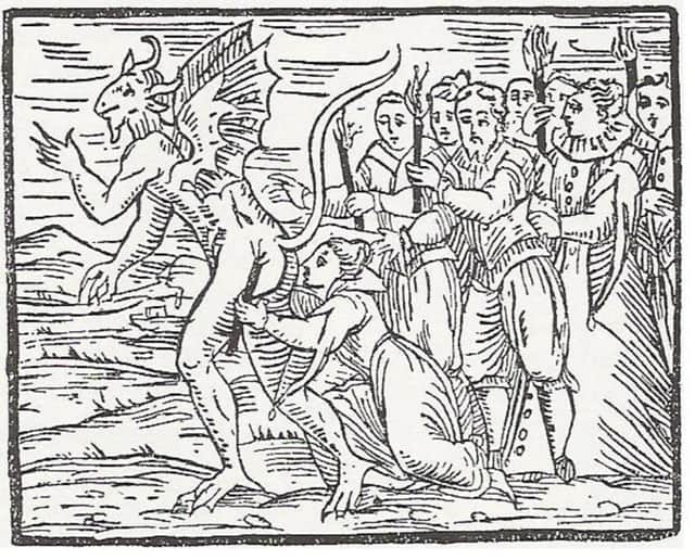 Kissing the devil on the bottom - here illustrated in 1608 - was one of the rituals observed at the great gatherings, or conventions, of witches. PIC: Creative Commons.
