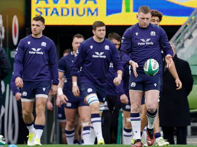 Scotland’s Ben White, Scott Cummings and Finn Russell emerge for a pre-match training session at the Aviva Stadium in Dublin ahead of the Six Nations clash with Ireland. (Picture: Brian Lawless/PA Wire)