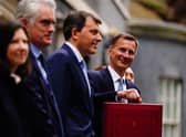 Chancellor of the Exchequer Jeremy Hunt leaves 11 Downing Street, London, with his ministerial box and members of his ministerial team before delivering his Budget at the Houses of Parliament. Picture: Victoria Jones/PA Wire