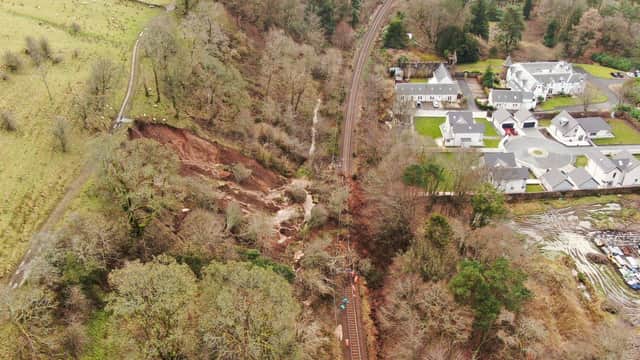 The hillside at Fairlie was still moving a day after the landslip on Friday night. Picture: Network Rail