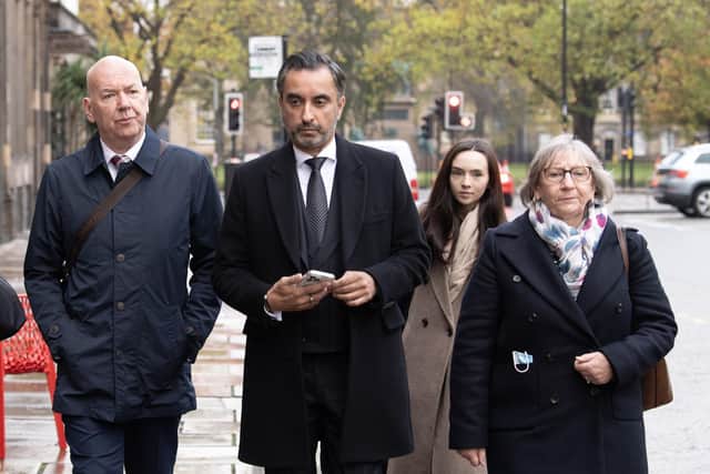 Bereaved relatives Alan Inglis (left), Margaret Waterton (right), and the lead solicitor for the Scottish Covid Bereaved, Aamer Anwar (centre), arrive for a hearing at the Covid-19 pandemic inquiry at George House in Edinburgh. Photo: Lesley Martin/PA Wire