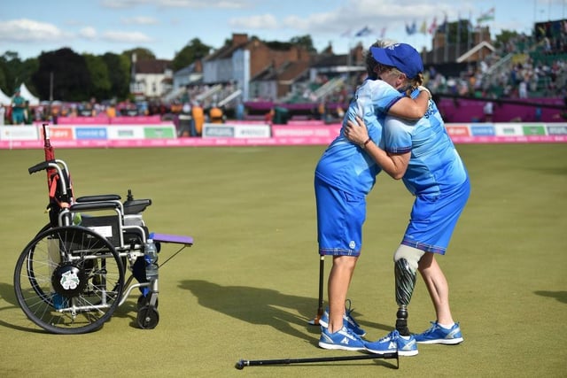 Rosemary Lenton and Pauline Wilson of Team Scotland celebrate their victory in the lawn bowls Para Women's Pairs B6-B8 after triumphing over Australia in the gold medal match.
