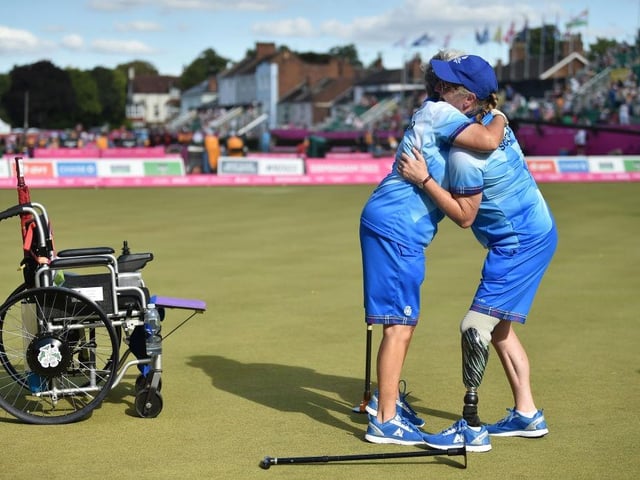 Rosemary Lenton and Pauline Wilson of Team Scotland celebrate their victory in the lawn bowls Para Women's Pairs B6-B8 after triumphing over Australia in the gold medal match.