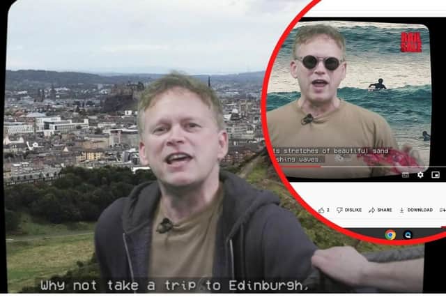 The UK transport secretary Grant Shapps advertises a trip to Edinburgh as he wears a hoodie and holds a fake crab announcing train tickets sale.
