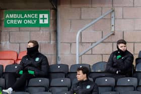Hibs' Ryan Porteous (L) and Kevin Nisbet (R) were left on the bench against Dundee United after being linked with moves away from the club. Photo by Ross Parker / SNS Group