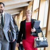 First Minister Humza Yousaf and Deputy First Minister Shona Robison (right) arrive for First Minister's Questions (FMQs) in the main chamber of the Scottish Parliament in Edinburgh.