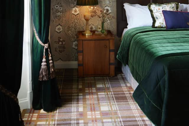 The bedrooms are decorated in a rich palette of browns and greens.
