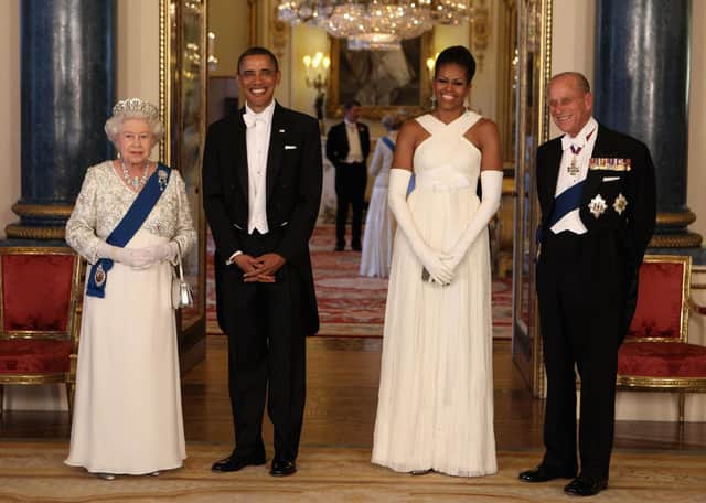 Queen Elizabeth and the Duke of Edinburgh posing with then US President Barack Obama and First Lady Michelle Obama in 2011