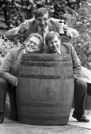 Buff Hardie looms over George Donald and Stephen Robertson in 1989
