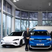 Brian Gilda, chairman, and Nicola Gilda, managing director, with some of the vehicles that Peoples sells.