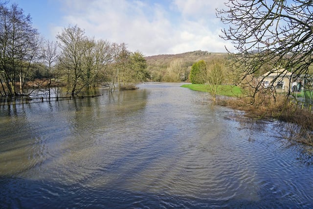 At the point where the River Amber meets the Derwent in Ambergate, with Ambergate Cricket Club under water.