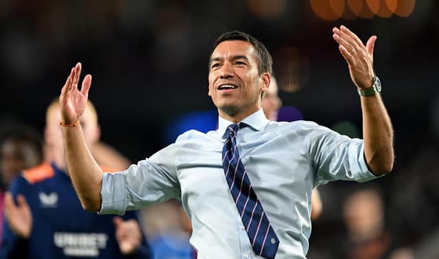Giovanni van Bronckhorst celebrates Rangers' victory against PSV Eindhoven.