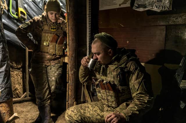 Ukrainian soldiers Kristina and Chorny in a bunker on the frontline with Russian-backed separatists in Zolote, Ukraine, earlier this month (Picture: Brendan Hoffman/Getty Images)