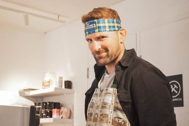 Scotland rugby captain John Barclay serving a new coffee set up to help raise cash for the charity set up by Doddie Weir as he battles Motor Neurone Disease