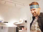 Scotland rugby captain John Barclay serving a new coffee set up to help raise cash for the charity set up by Doddie Weir as he battles Motor Neurone Disease