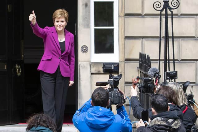 Scottish First Minister and SNP leader Nicola Sturgeon on the steps outside Bute House. Picture: PA