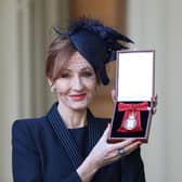 SNP leadership candidates were asked in a TV debate whether they thought JK Rowling, seen with her Companion of Honour medal, was a 'national treasure' (Picture: Andrew Matthews/WPA pool/Getty Images)