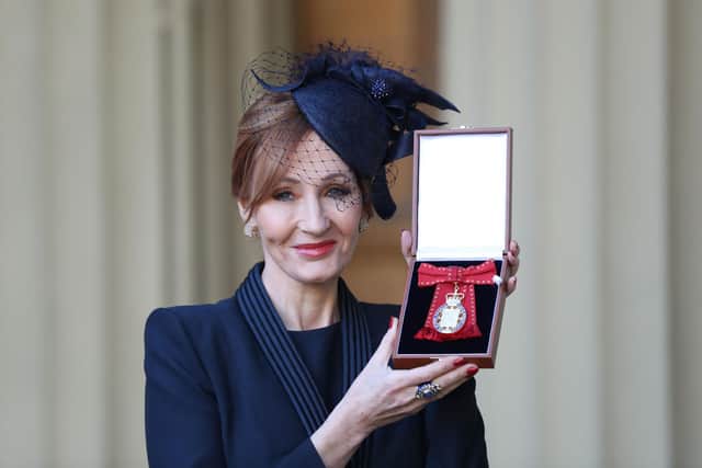 SNP leadership candidates were asked in a TV debate whether they thought JK Rowling, seen with her Companion of Honour medal, was a 'national treasure' (Picture: Andrew Matthews/WPA pool/Getty Images)