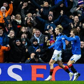 Todd Cantwell (L) celebrates with Fabio Silva after scoring to make it 2-1 to Rangers against Aberdeen.