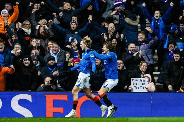 Todd Cantwell (L) celebrates with Fabio Silva after scoring to make it 2-1 to Rangers against Aberdeen.