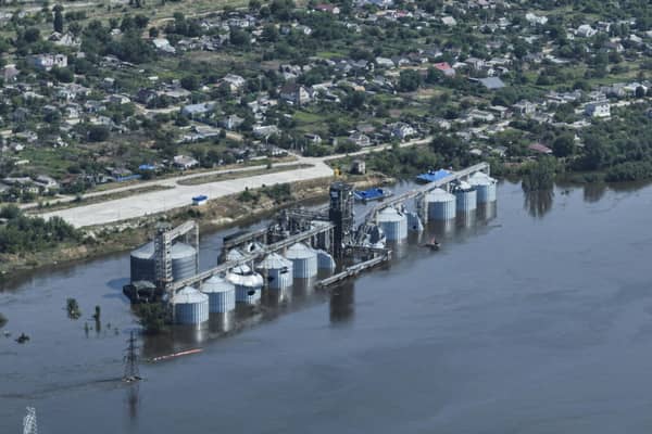 Grain storage sits underwater after the collapsed of the Kakhovka Dam, in Kozatske, Ukraine (AP Photo)