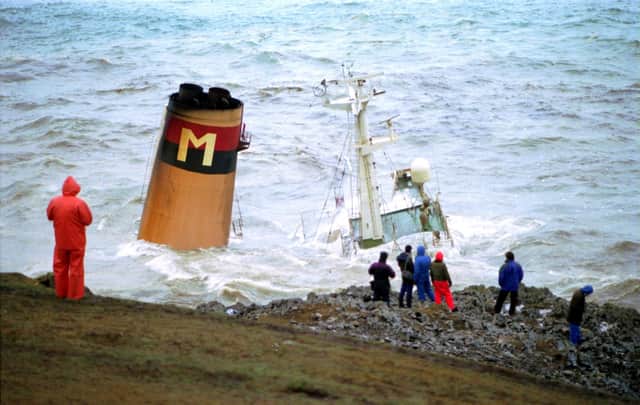The Braer oil tanker sinks in Shetland's Quendale Bay after discharging her cargo into the sea and the surrounding coastline in January 1993 (Picture: Allan Milligan)