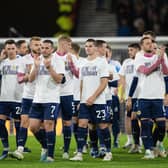 Scotland players wear 'We're off to Germany' tee-shirts during a lap of honour after the 3-3 draw with Norway at Hampden. (Photo by Paul Devlin / SNS Group)