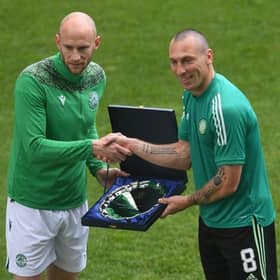 David Gray presents Scott Brown with a gift on his last Celtic appearence, which came against Hibs at Easter Road on May 2021. (Photo by Craig Foy / SNS Group)