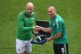 David Gray presents Scott Brown with a gift on his last Celtic appearence, which came against Hibs at Easter Road on May 2021. (Photo by Craig Foy / SNS Group)