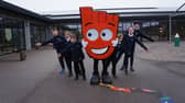 Pupils from Midmill Primary School with Strider, Living Streets' mascot.
