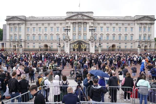 The scene at Buckingham Palace