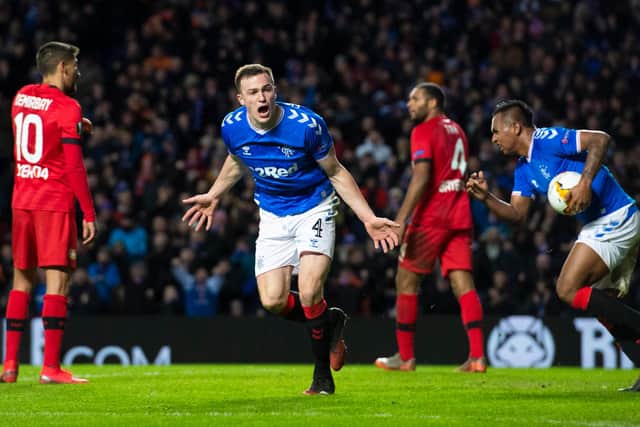 George Edmundson celebrates his goal for Rangers during the Europa League last 16 first leg tie against Bayer Leverkusen, at Ibrox. The German side won 3-1. Picture: SNS