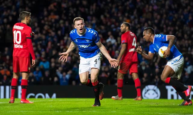 George Edmundson celebrates his goal for Rangers during the Europa League last 16 first leg tie against Bayer Leverkusen, at Ibrox. The German side won 3-1. Picture: SNS