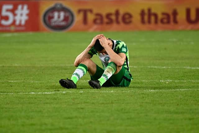 Nigeria's Leon Balogun reacts after Ghana's victory (Photo by PIUS UTOMI EKPEI/AFP via Getty Images)