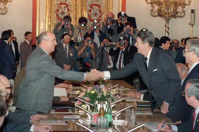 In June 1988, the then US President Ronald Reagan shakes hands with then Soviet leader Mikhail Gorbachev ahead of a summit (Picture: Mike Sargent/AFP via Getty Images)